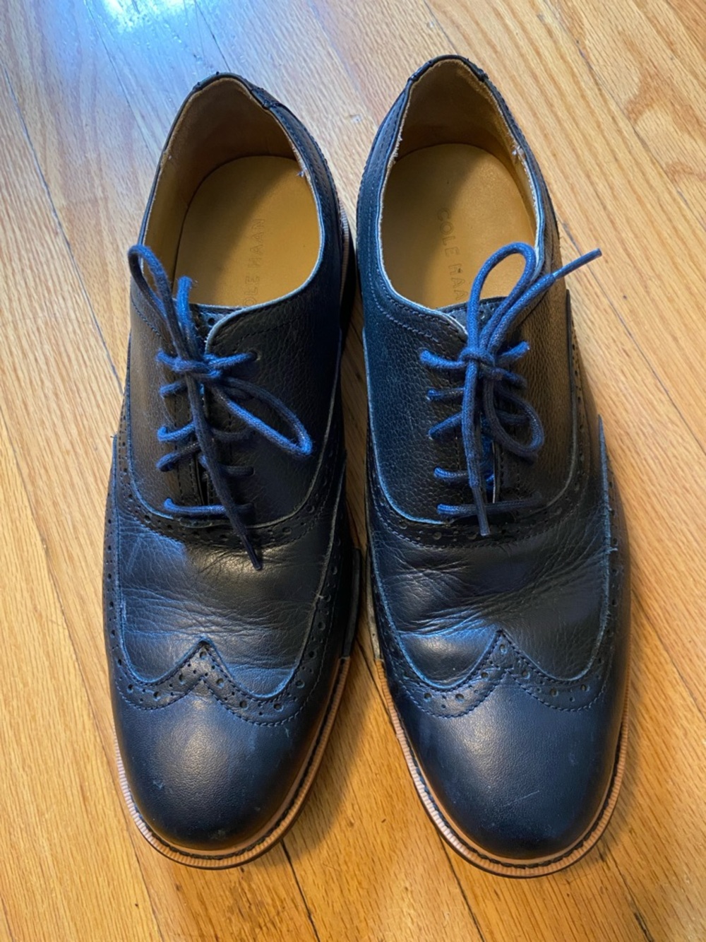 Cole Haan Black Leather Wingtip Oxfords with Tan Welt